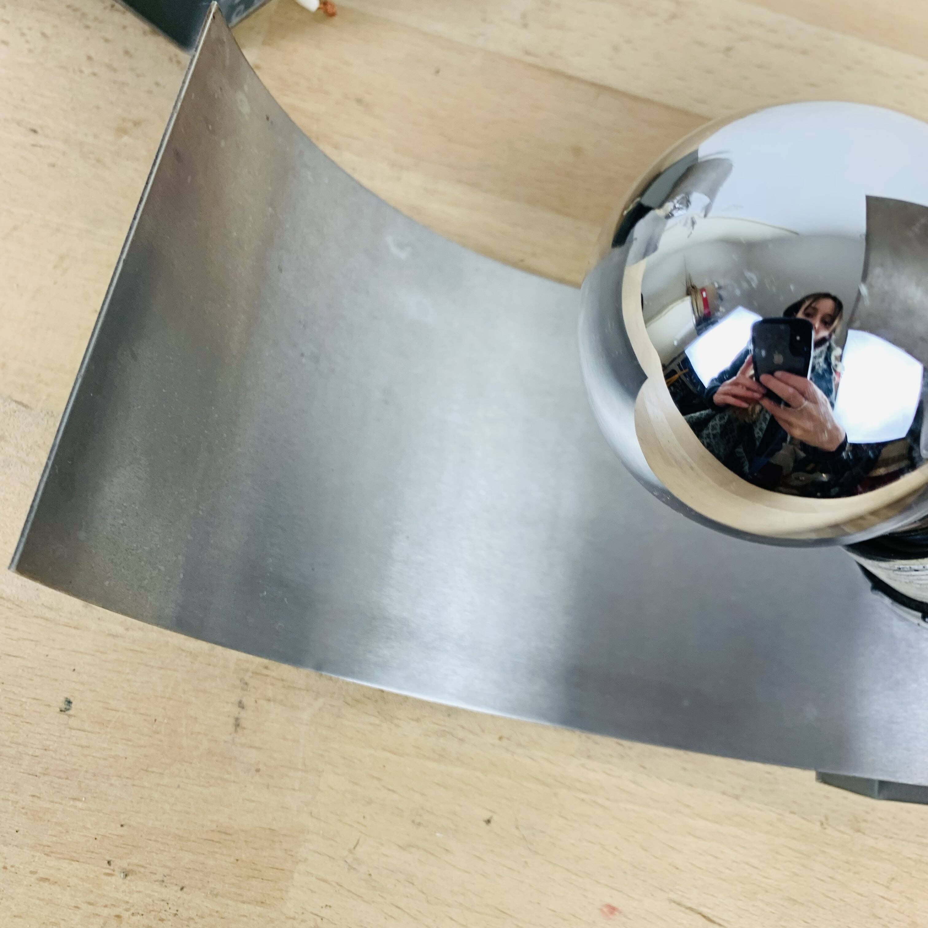 Pair of 70's brushed aluminum space age wall lights
