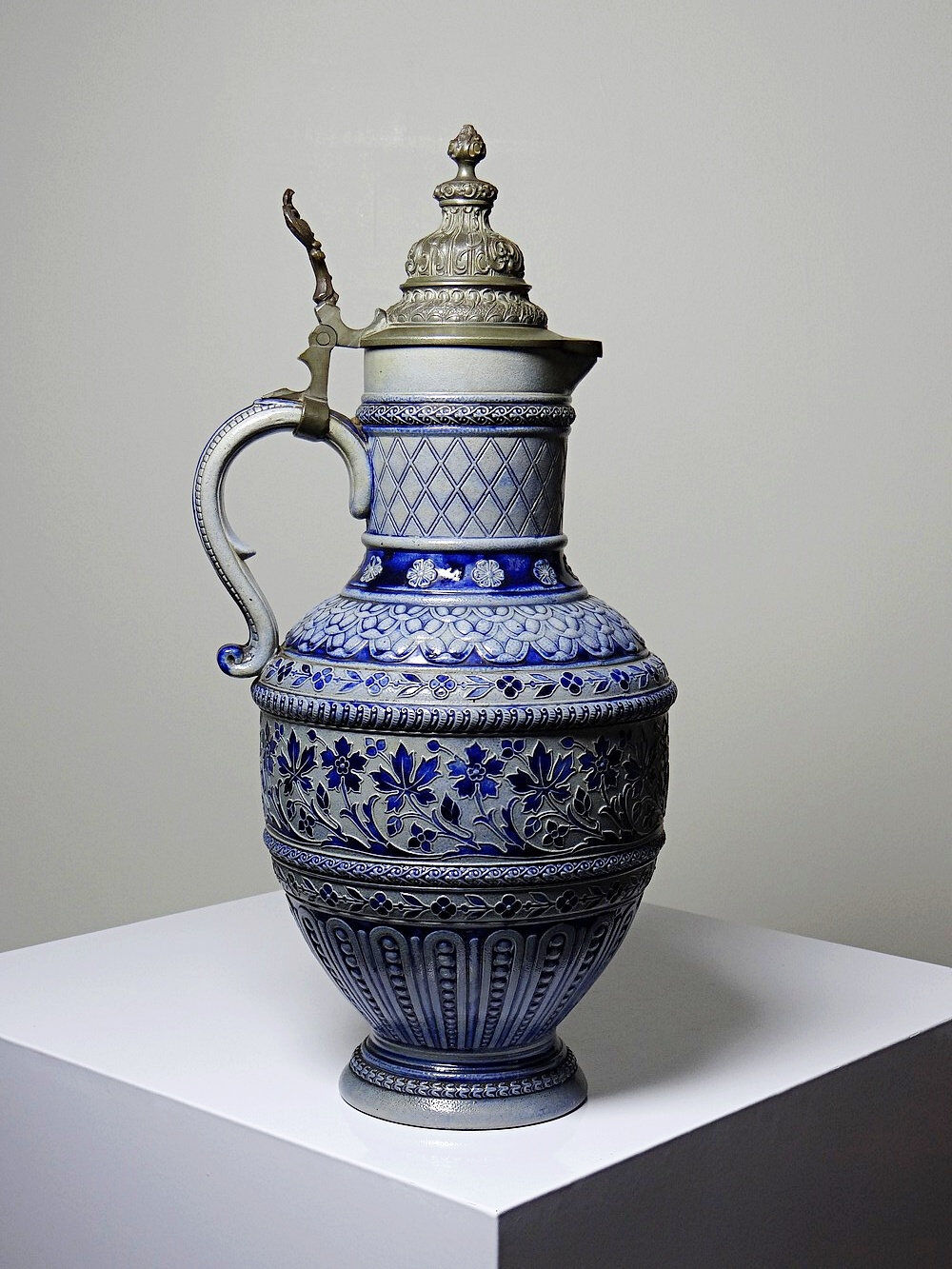 Large salt-glazed stoneware beer jug with tin, Germany, Westerwald type.