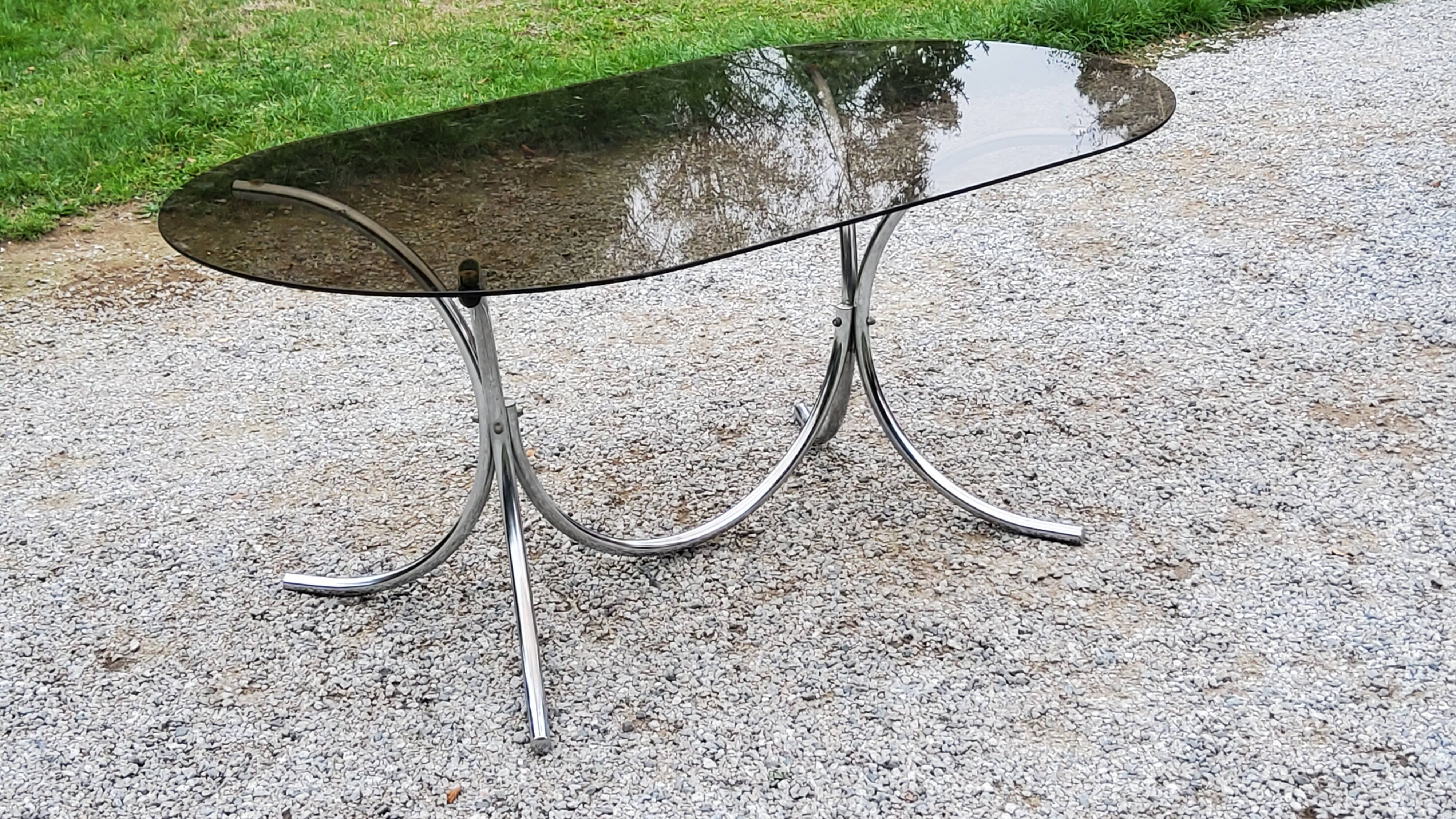 Dining table from the 70s top smoked glass base chrome