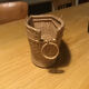 Old wicker bottle holder