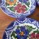 8 hand-painted plates