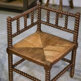 Pair of turned wooden corner chairs from the 1950s.