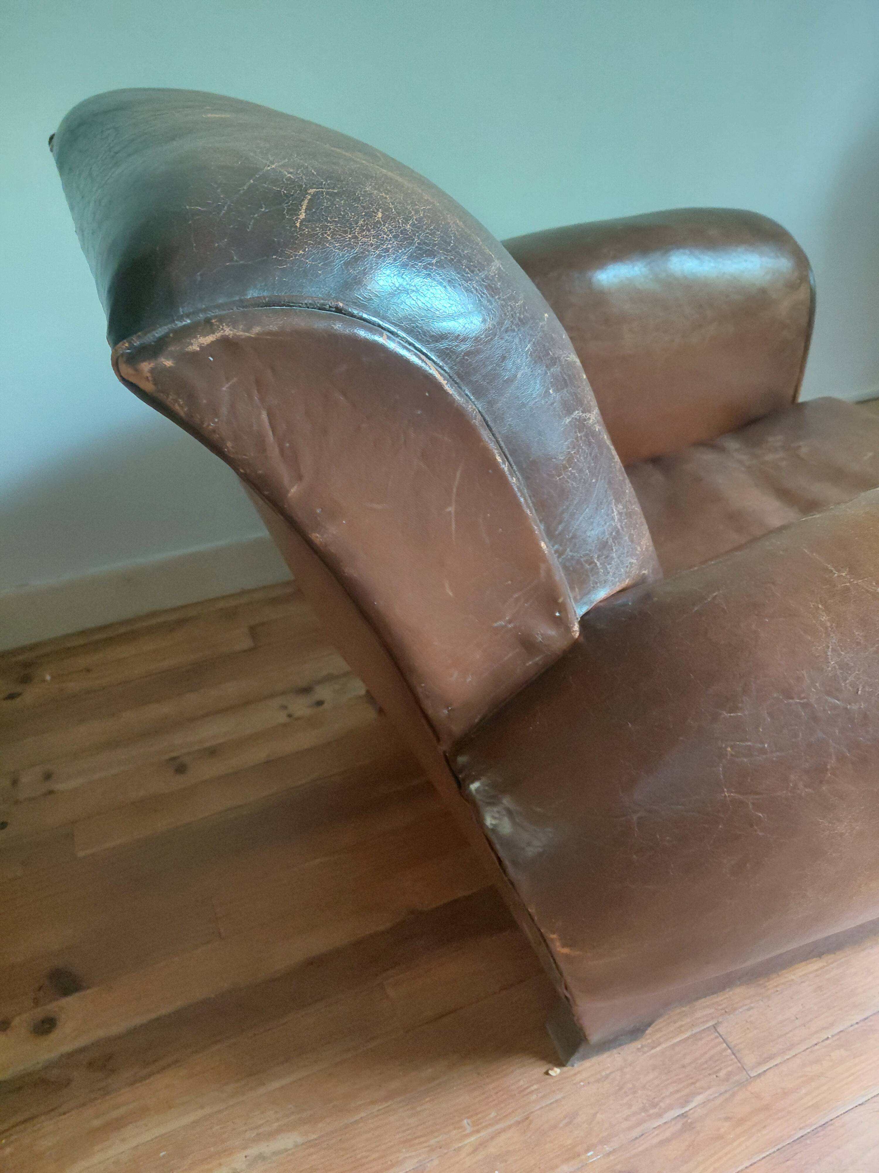 Club armchair, patinated leather