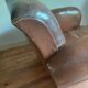 Club armchair, patinated leather