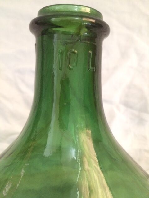 Demijohn with a beautiful glass mixing green and brown