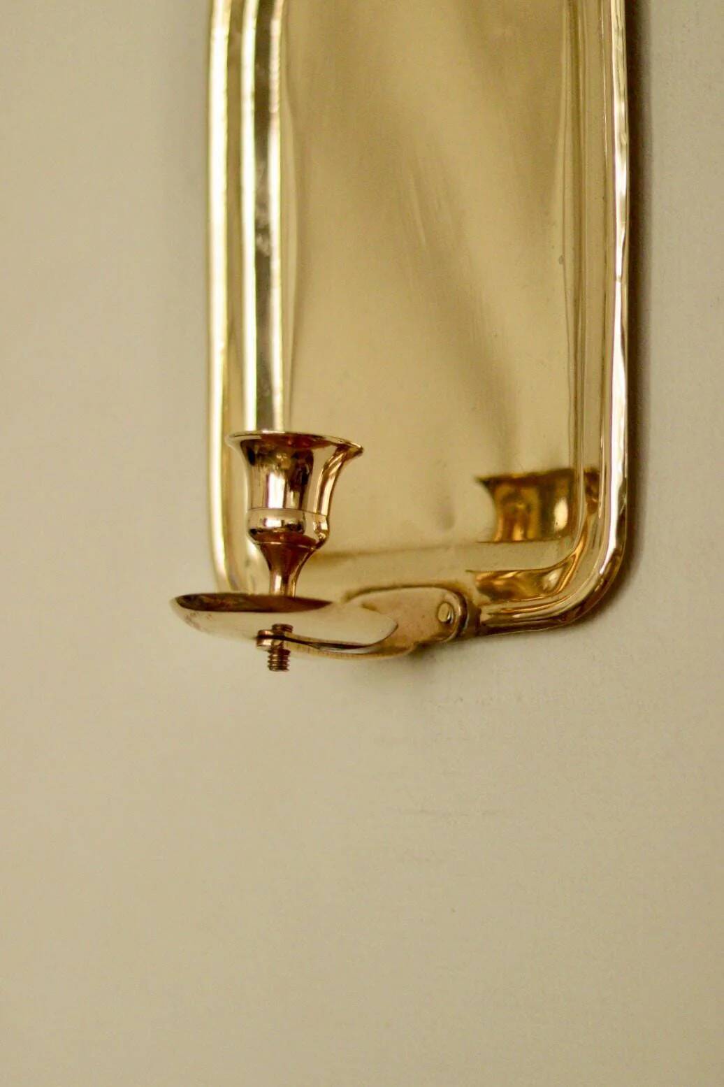 Single mid-century Swedish brass sconce