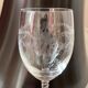 Set of 9 tall twisted and engraved crystal wine glasses