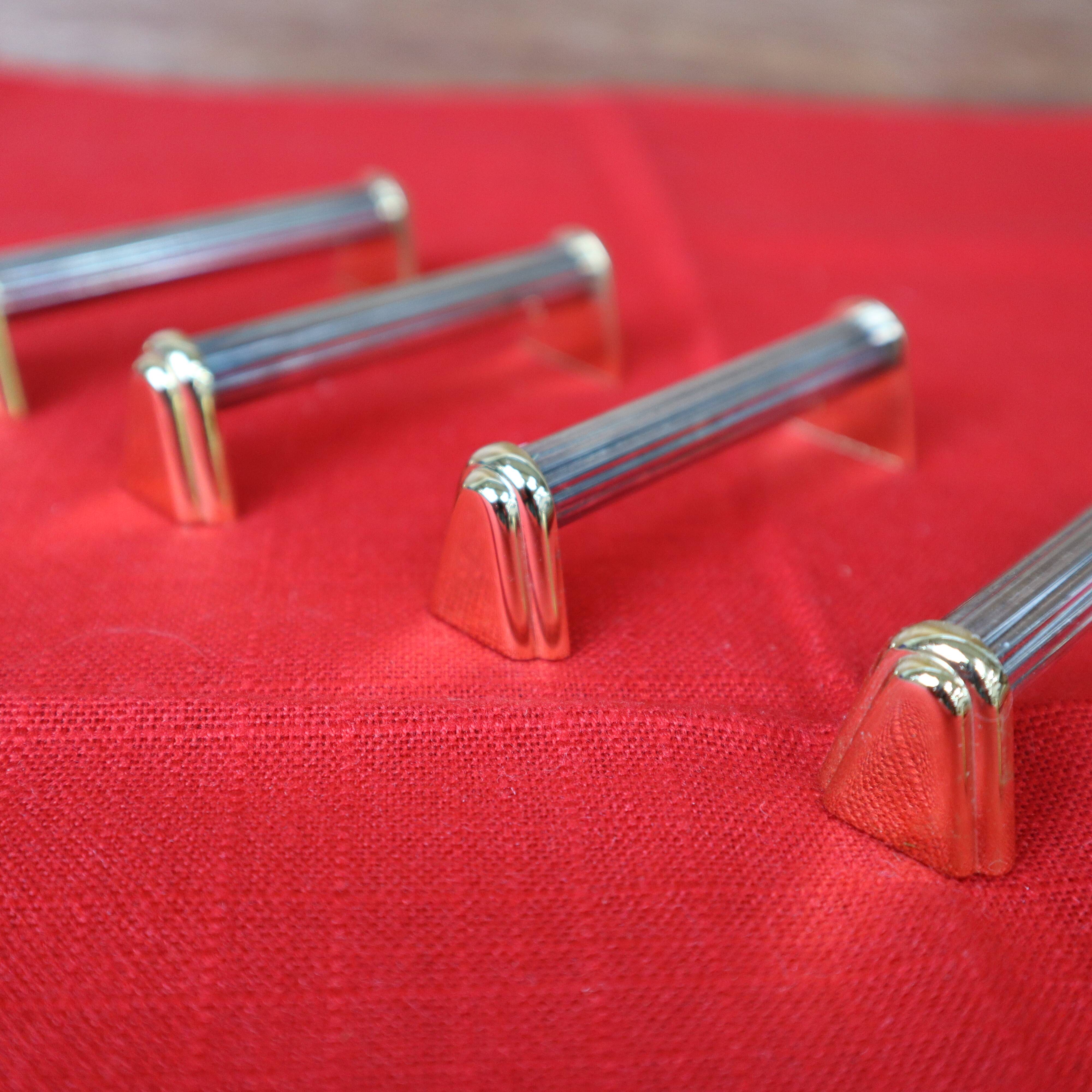 Set of 6 silver and gold metal knife holders