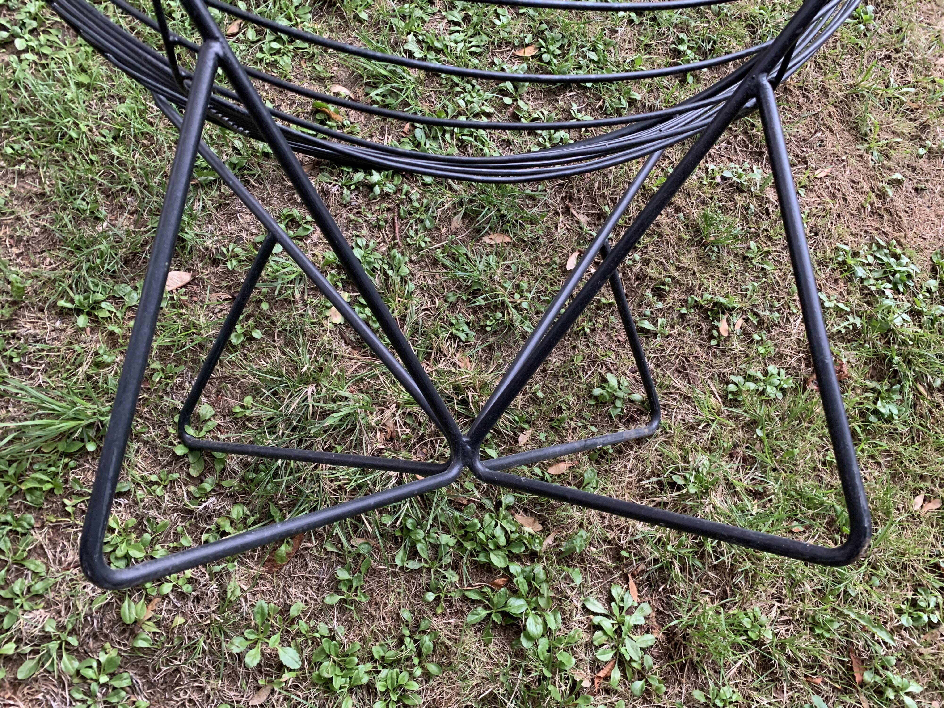 Pair of round chairs in black tubular steel 1960