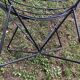 Pair of round chairs in black tubular steel 1960