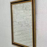 Vintage steel and brass mirror