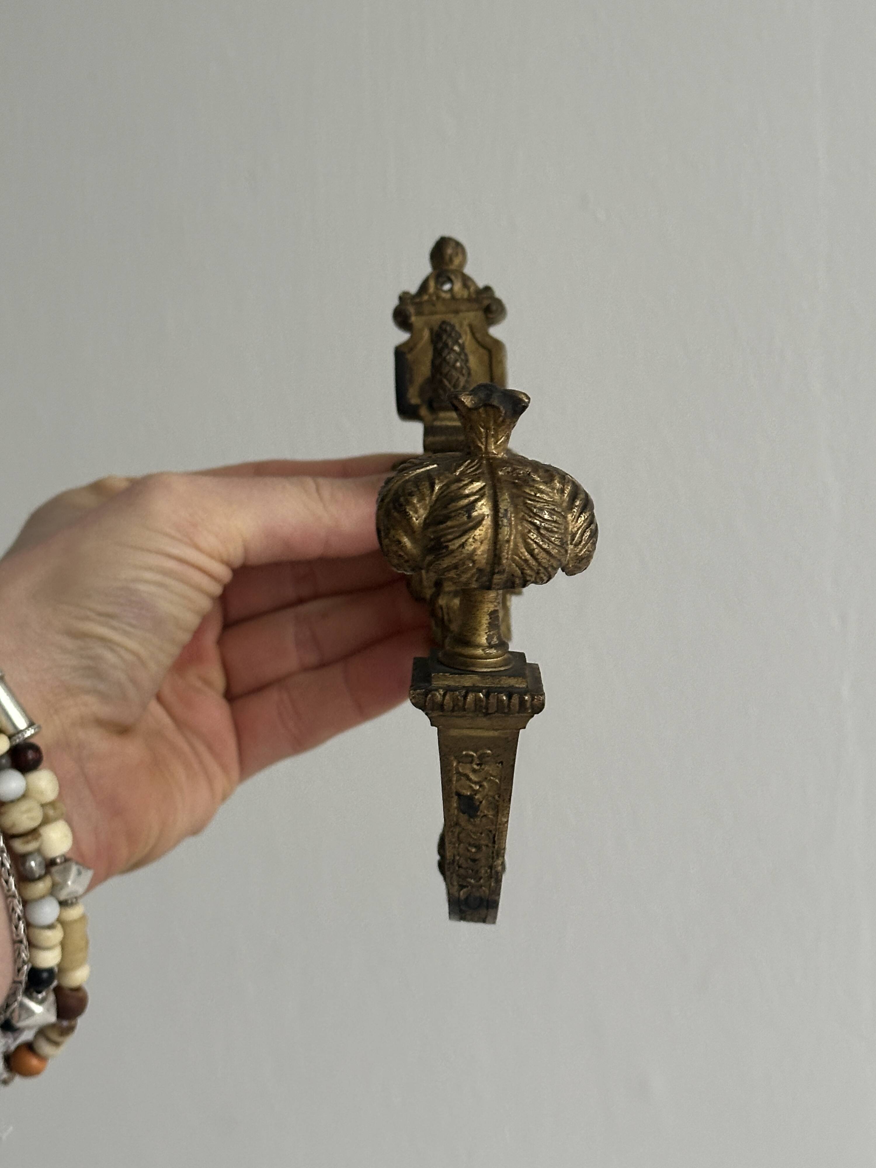 antique wall hook, gilded sculpted metal