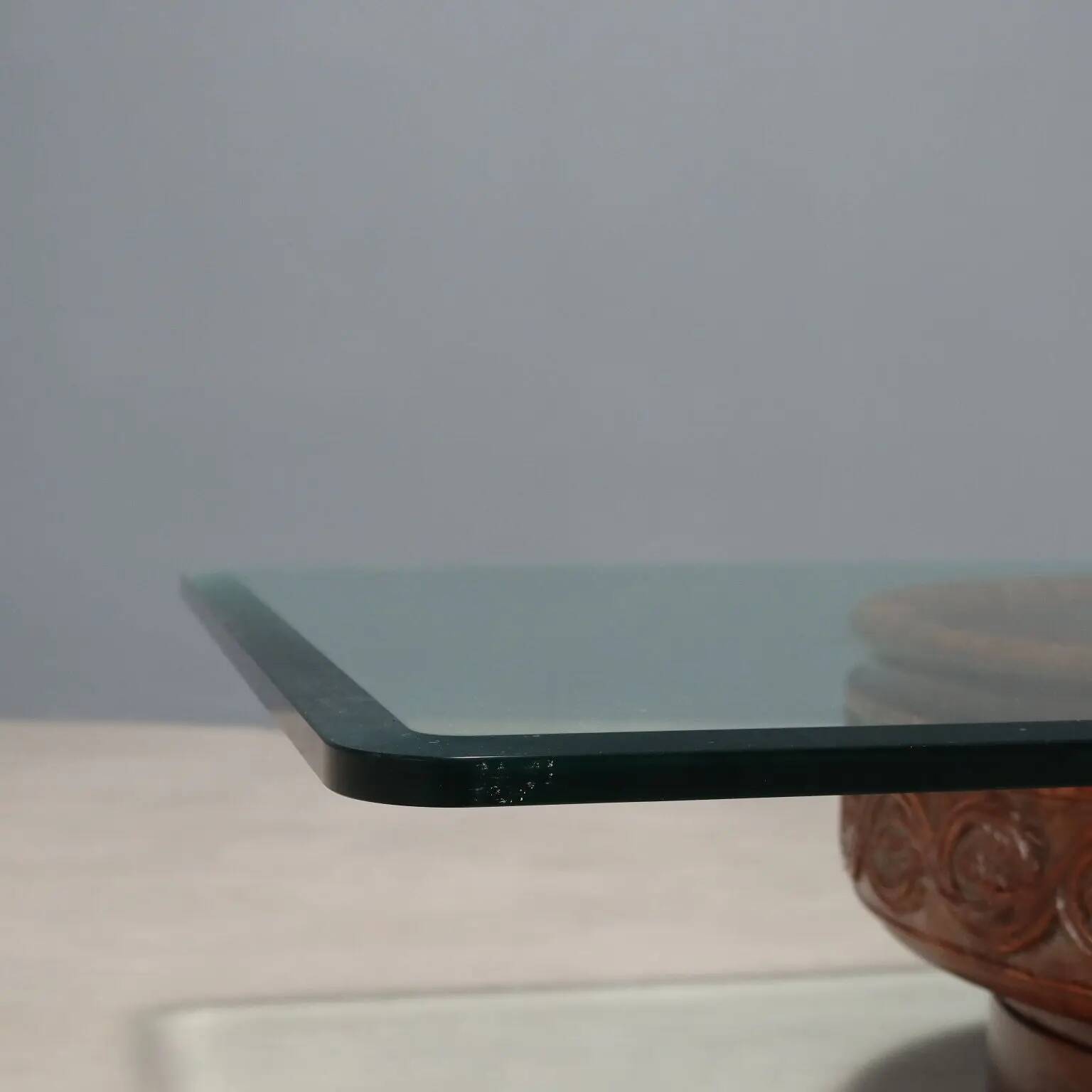 Vintage coffee table with a glass top and a terracotta base, 20th century.