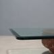 Vintage coffee table with a glass top and a terracotta base, 20th century.