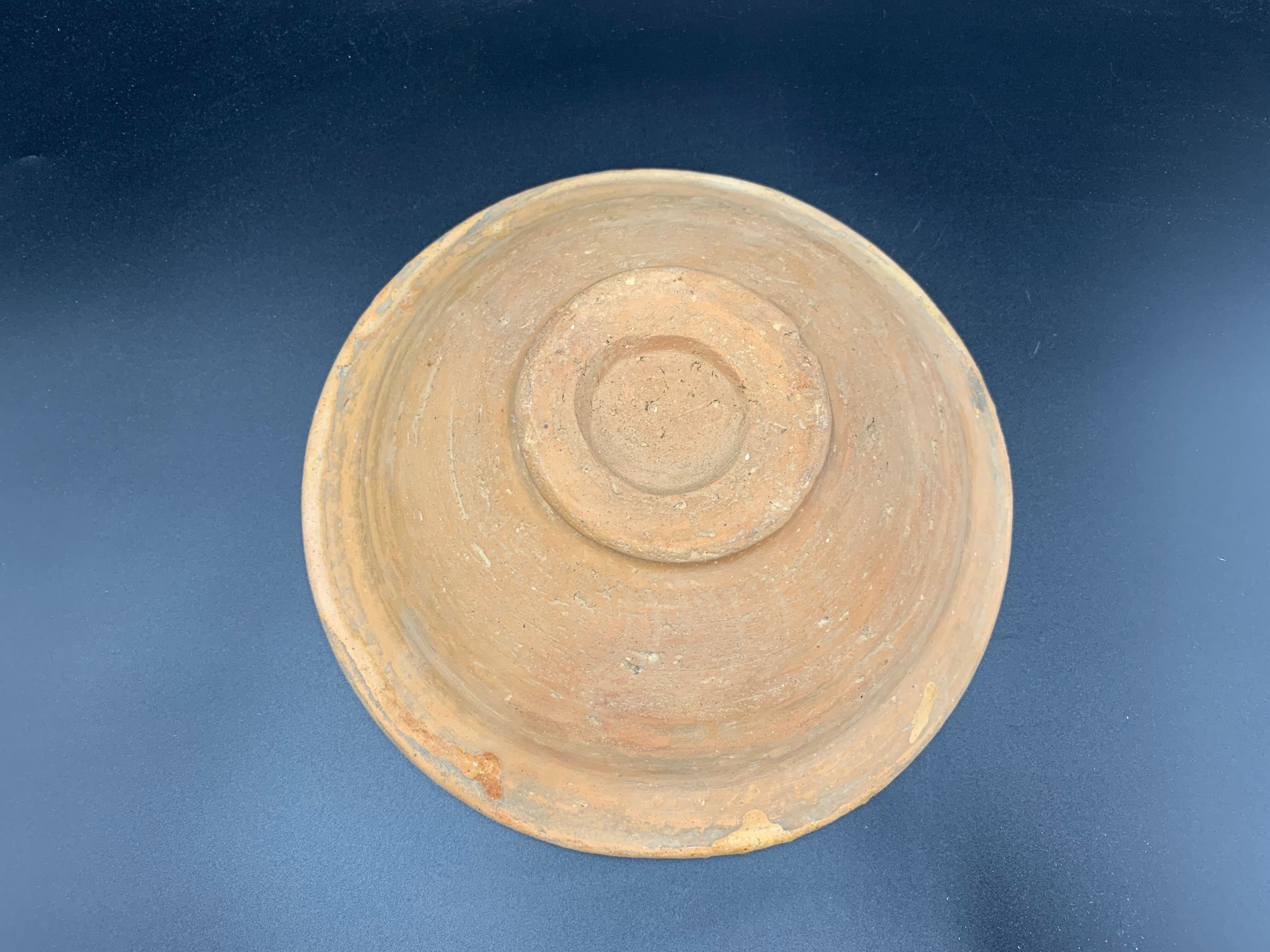 Ancient terracotta dish glazed with polychrome floral decoration, pakistan multan