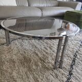 Round coffee table in smoked glass with chrome legs