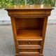 High bedside table, wooden accent table in Louis Philippe style.