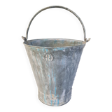 Old bucket with thick zinc handle