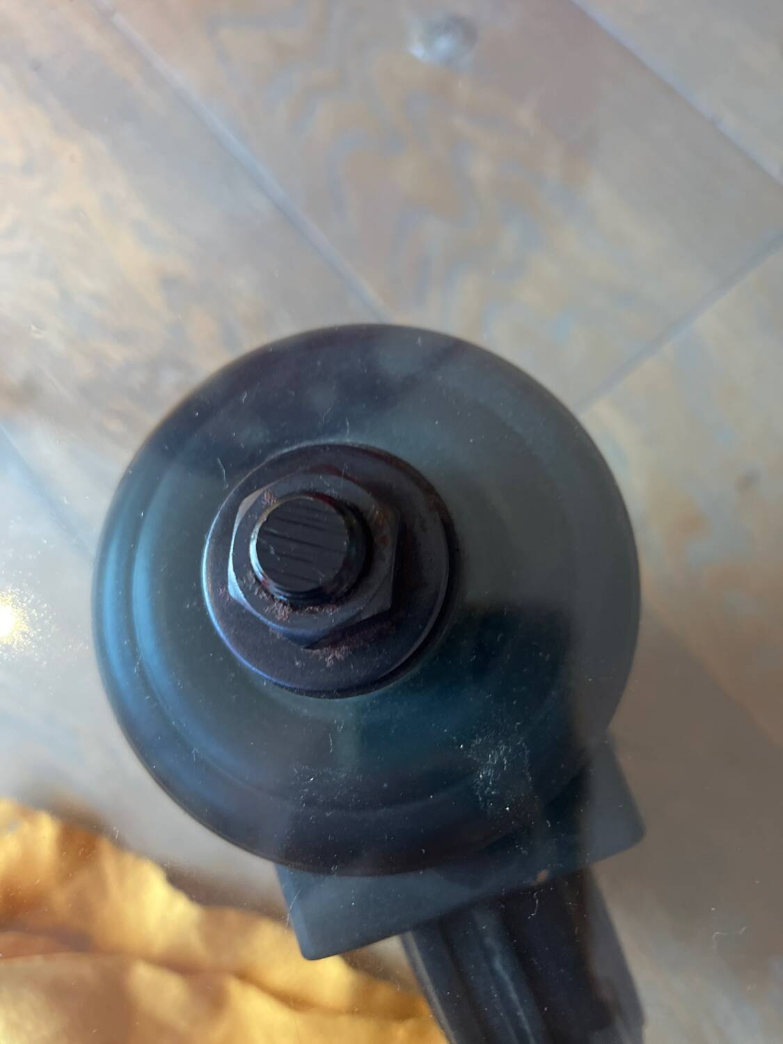 Gae Aulenti coffee table for Fontana Arte, transparent glass top with black cast iron supports, 1980s.