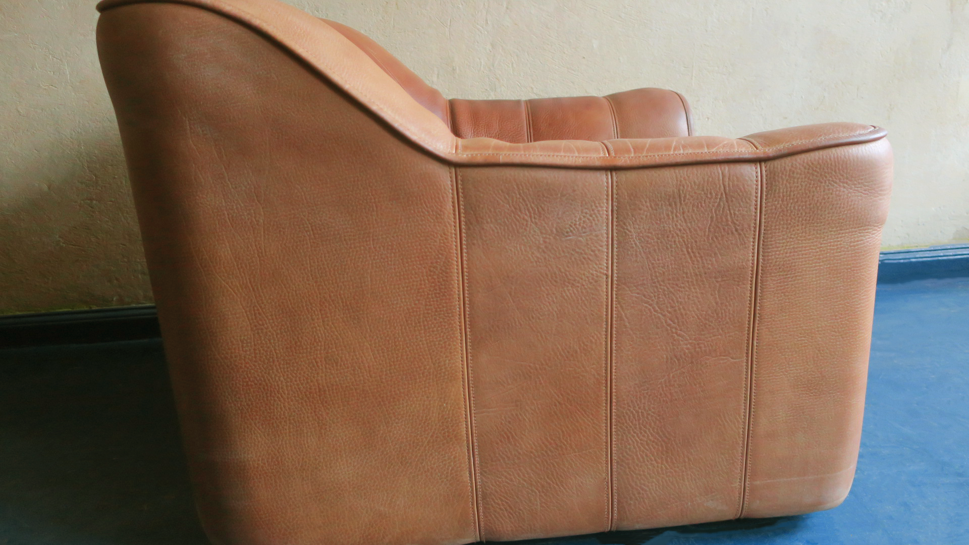 De Sede model DS44 patinated buffalo leather lounge chair and ottoman, 1970s