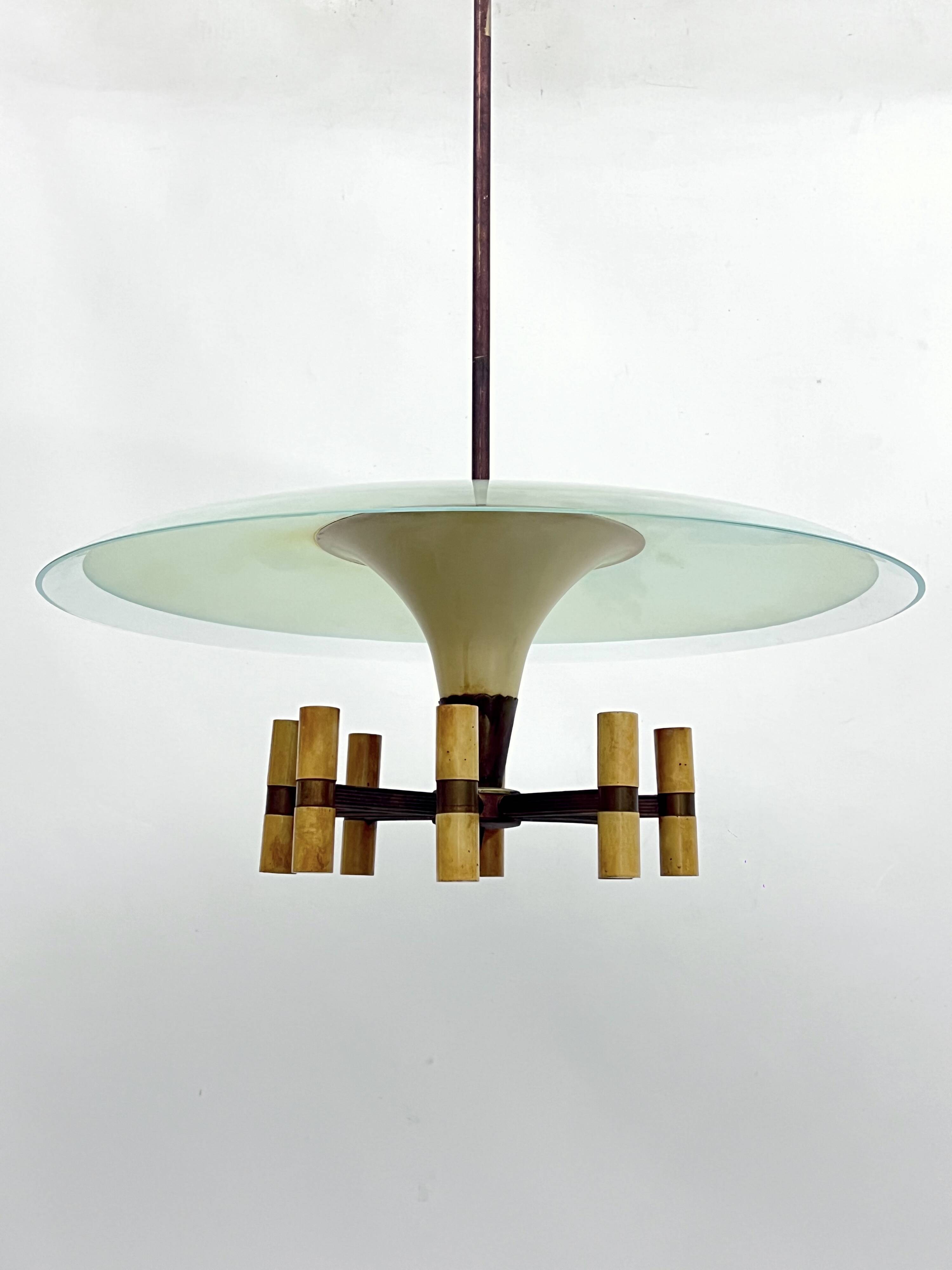 Curved glass disk chandelier. Italy 1950s