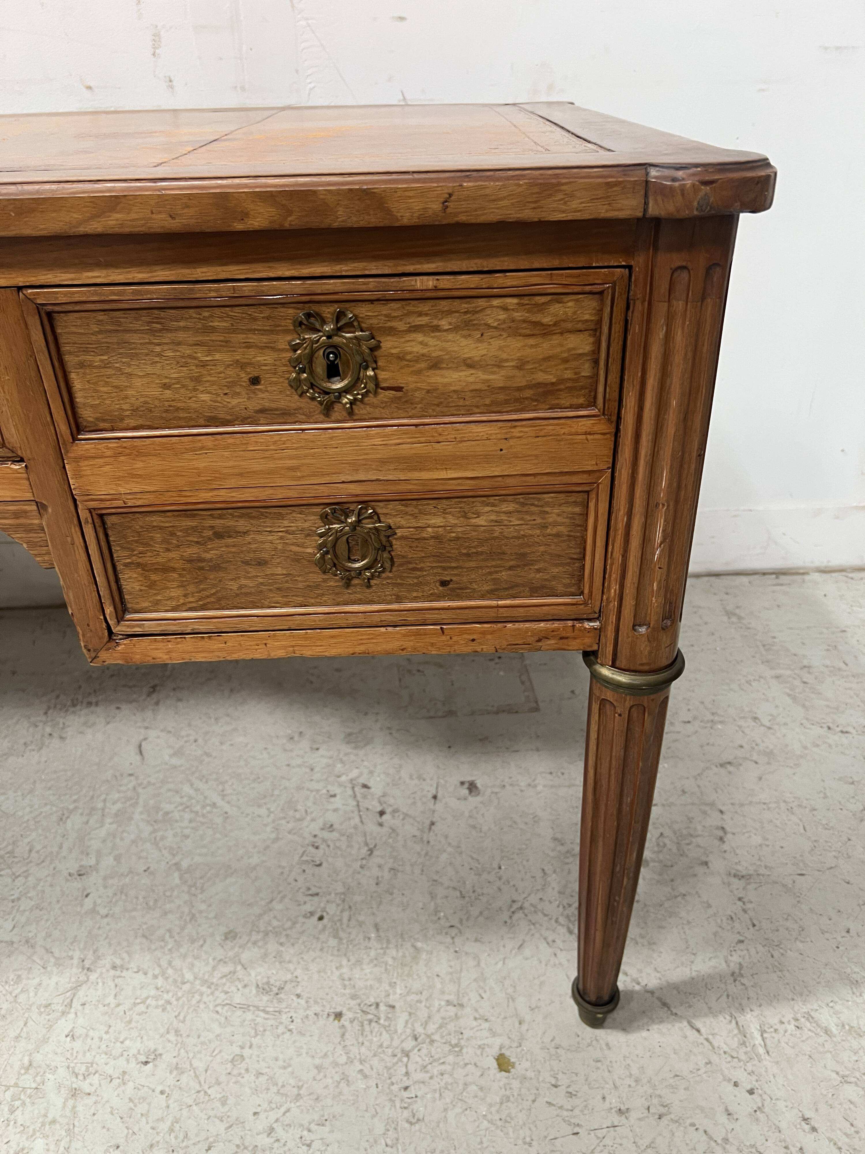 Louis XVI style walnut desk from the late 19th century.