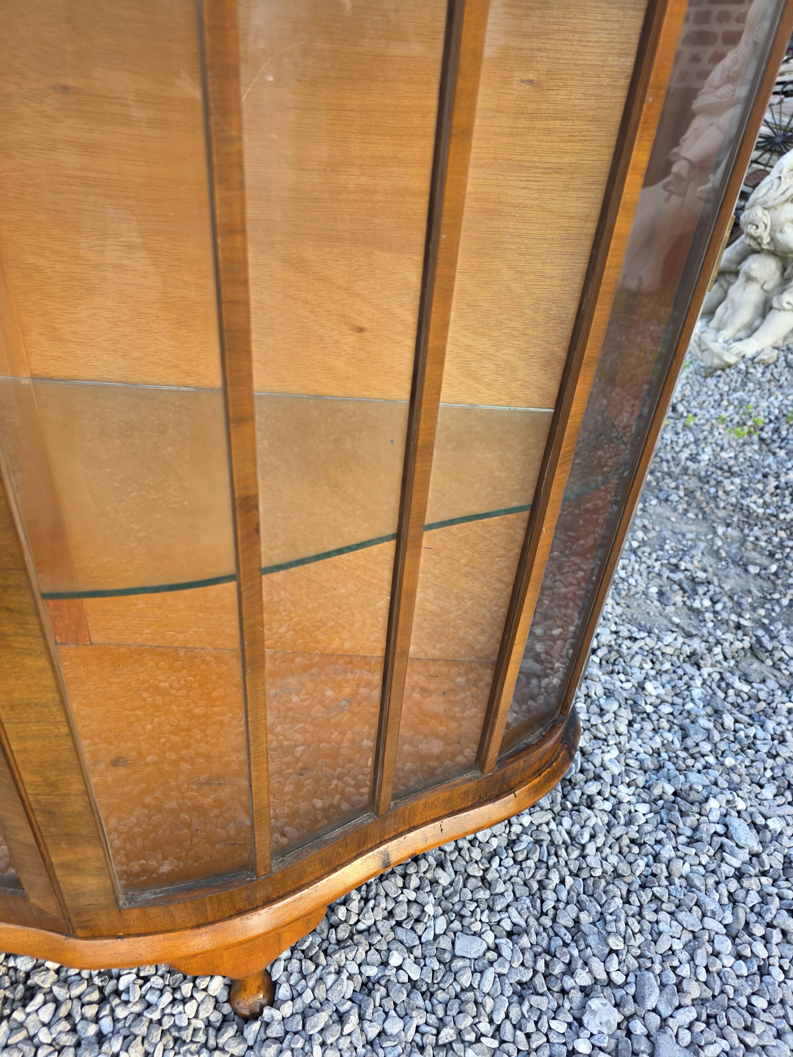 Art Deco display cabinet in walnut from the 1930s.