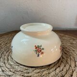 Flowery bowl with blue edging.