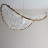 Curved rattan and rope pendant light