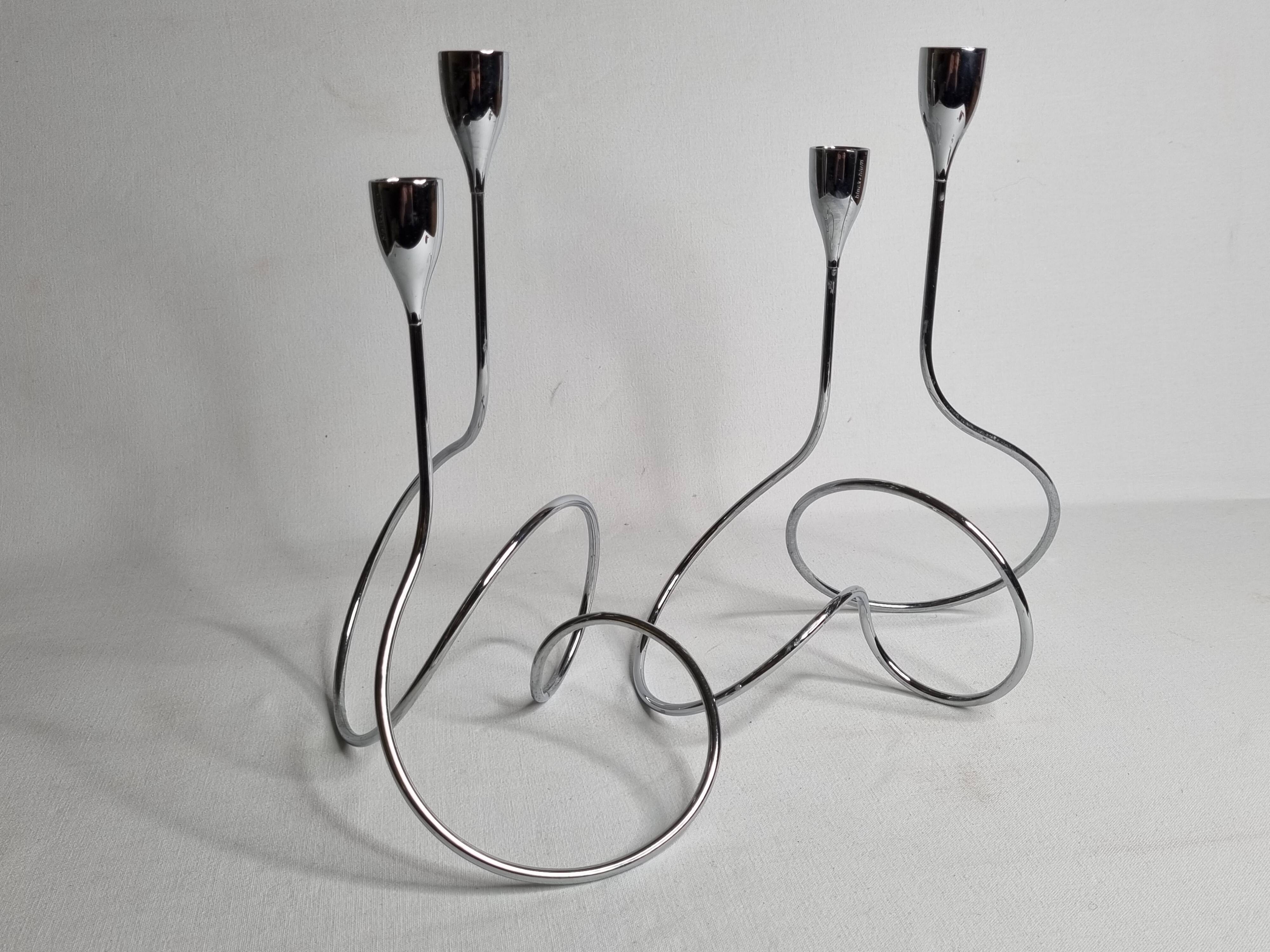 Pair of “Black & Blum” designer candlesticks in chrome-plated metal, 27 cm