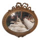 Louis XVI style oval beveled mirror