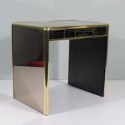 Occasional table or side table in Hollywood Regency style.