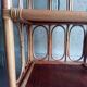 Shelf selette on wooden feet and vintage rattan