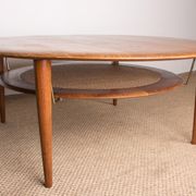 Round coffee table, two levels, danish in teak, brass and cannage
