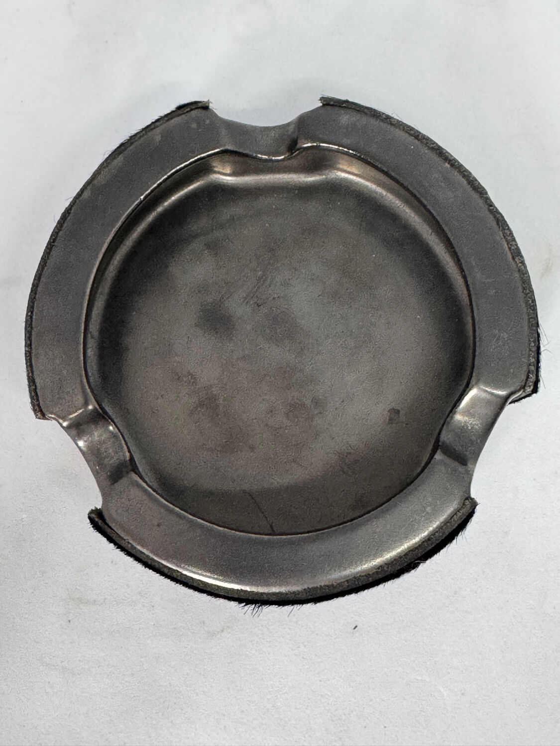 Vintage metal ashtray and hair