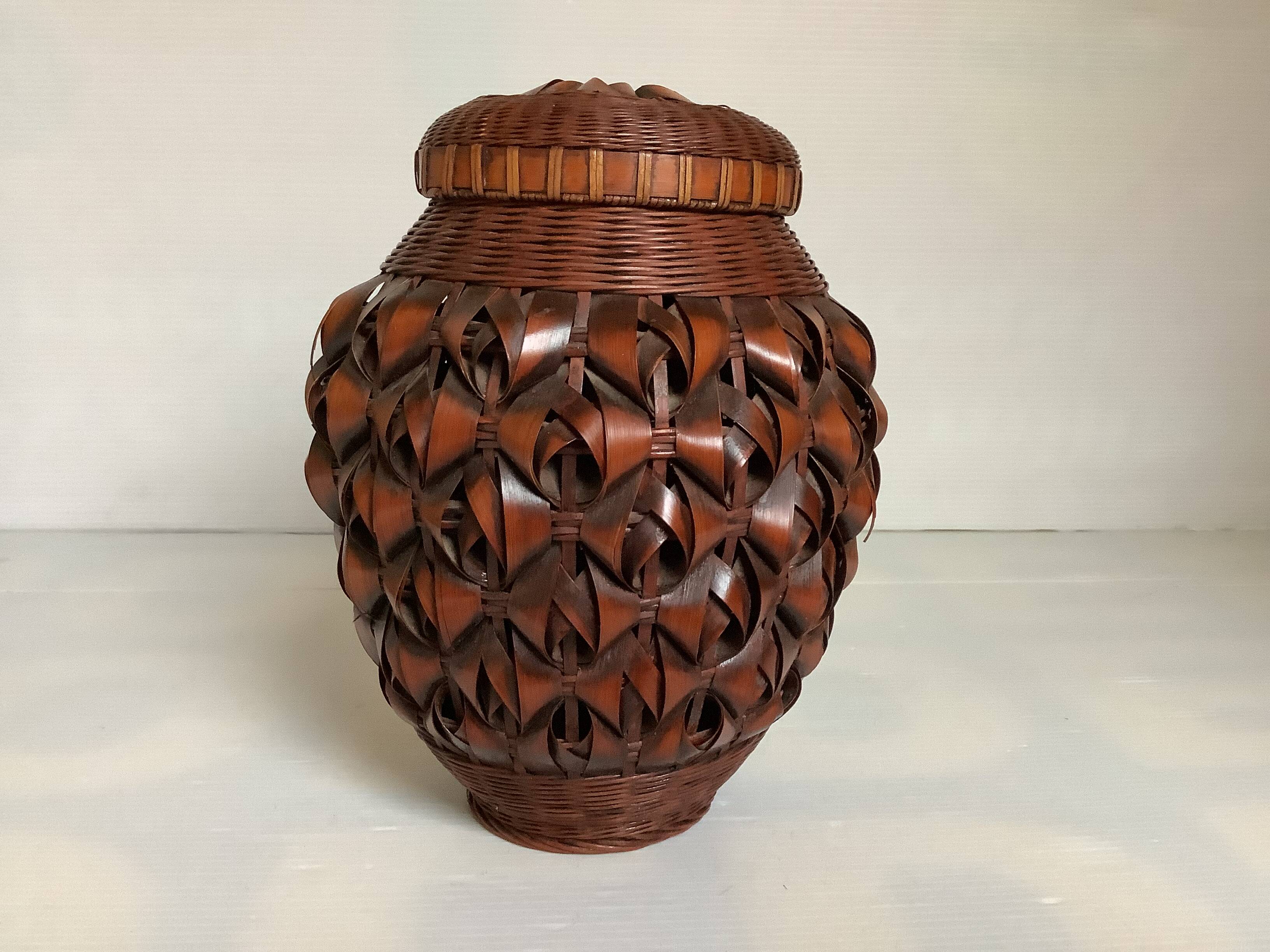 Covered wooden vase covered with woven bamboo
