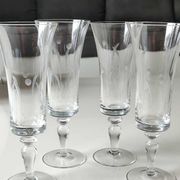 Set of 8 champagne flutes, flared neck. In crystal. Frosted plant motifs.