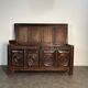 Large English chest from the 17th century in carved oak.