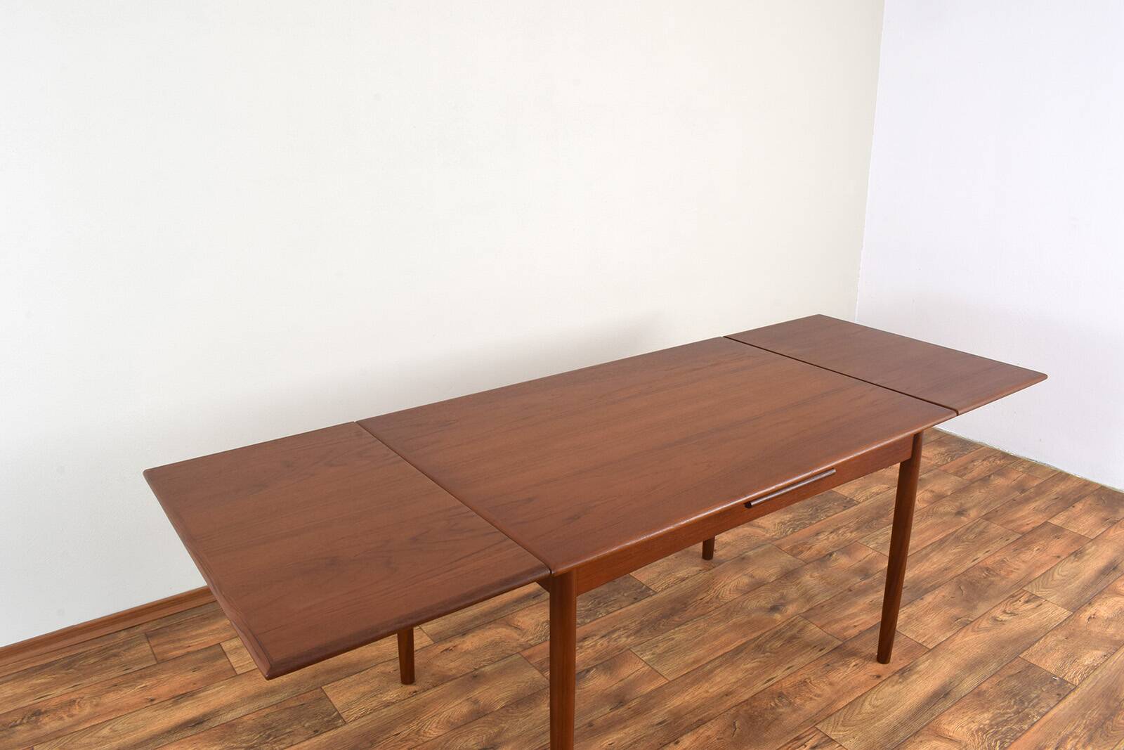 Mid-century Danish teak extendable dining table, 1960s.