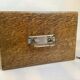 Old wooden box with handle and metal keys