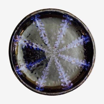 White terracotta dish enamelled with a blue sea urchin decoration