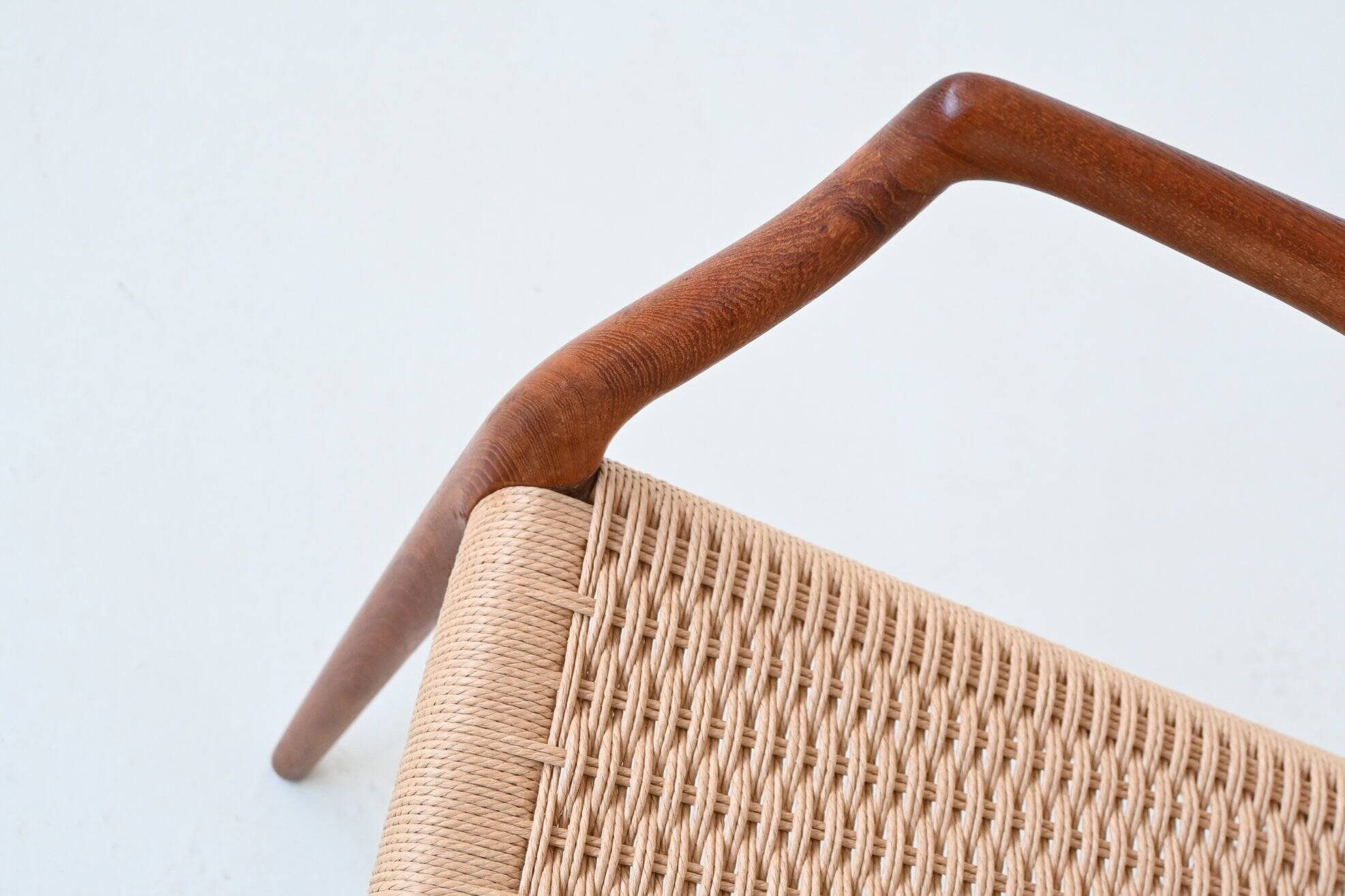Niels Otto Moller model 66 armchairs teak and paper cord Denmark 1974