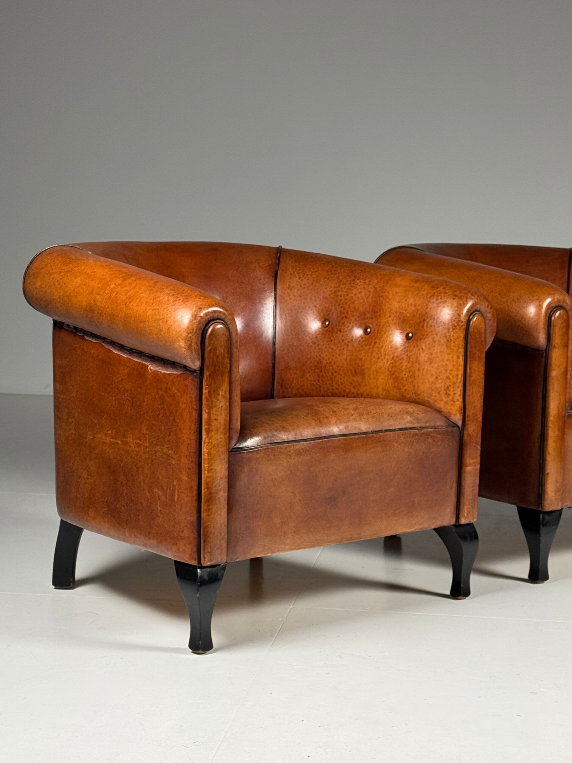 Ensemble de 2 fauteuils club en peau de mouton