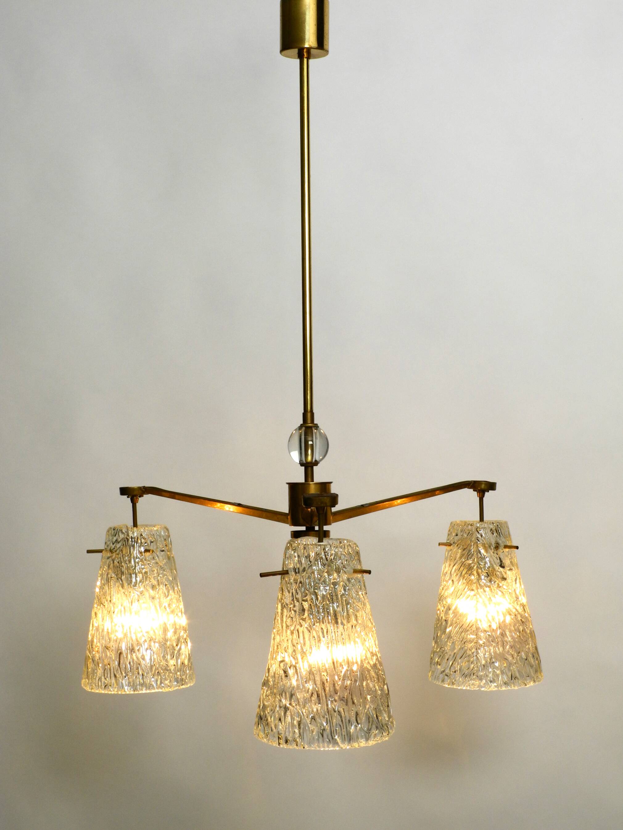 Heavy Mid Century ceiling lamp with three glass shades by Rupert Nikoll