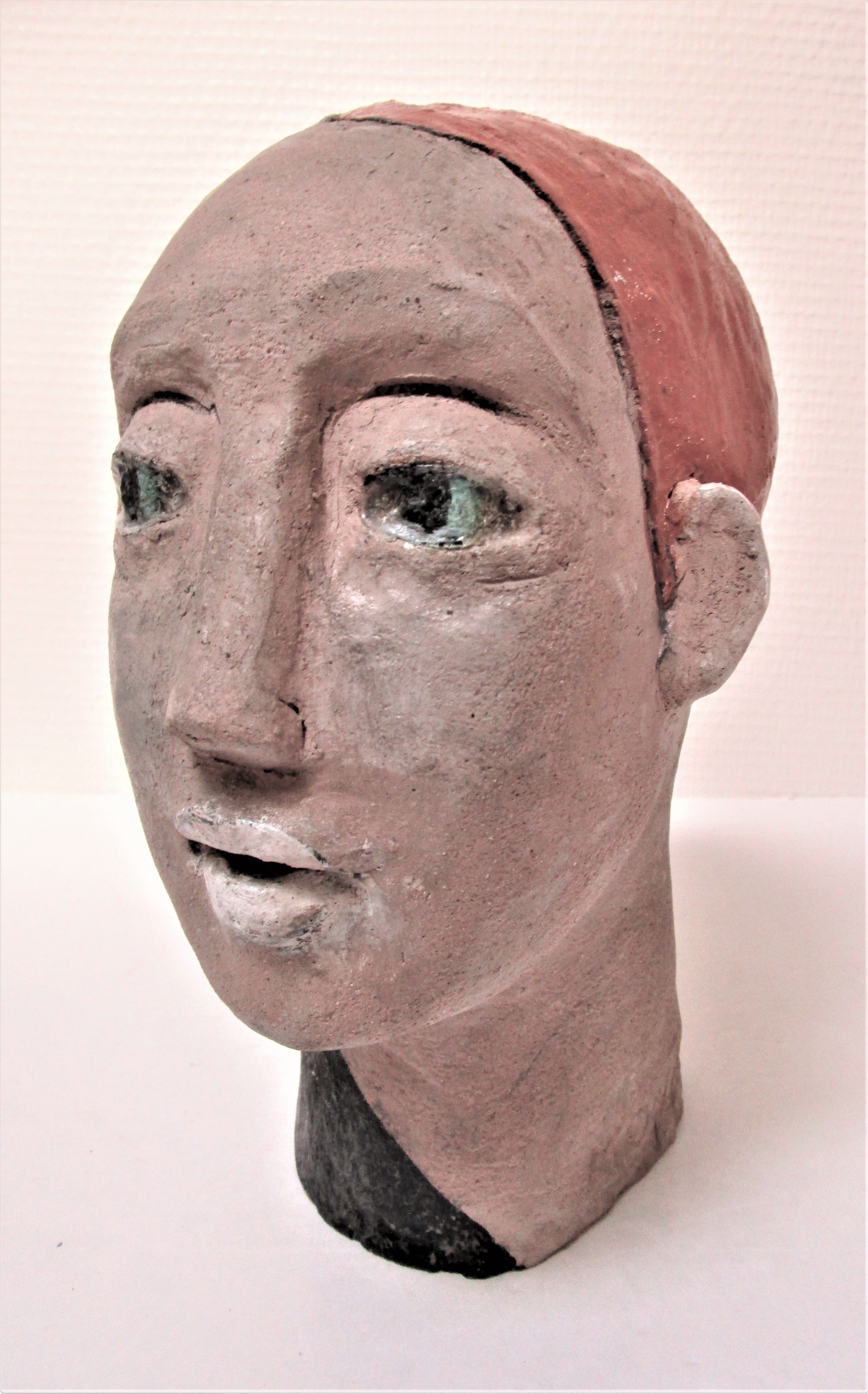 Redheaded boyish woman modeled in earth signed 60/70 years