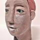 Redheaded boyish woman modeled in earth signed 60/70 years