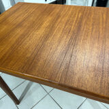 Large extendable Scandinavian table in vintage teak from the 1970s.