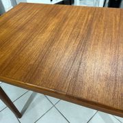 Large extendable Scandinavian table in vintage teak from the 1970s.