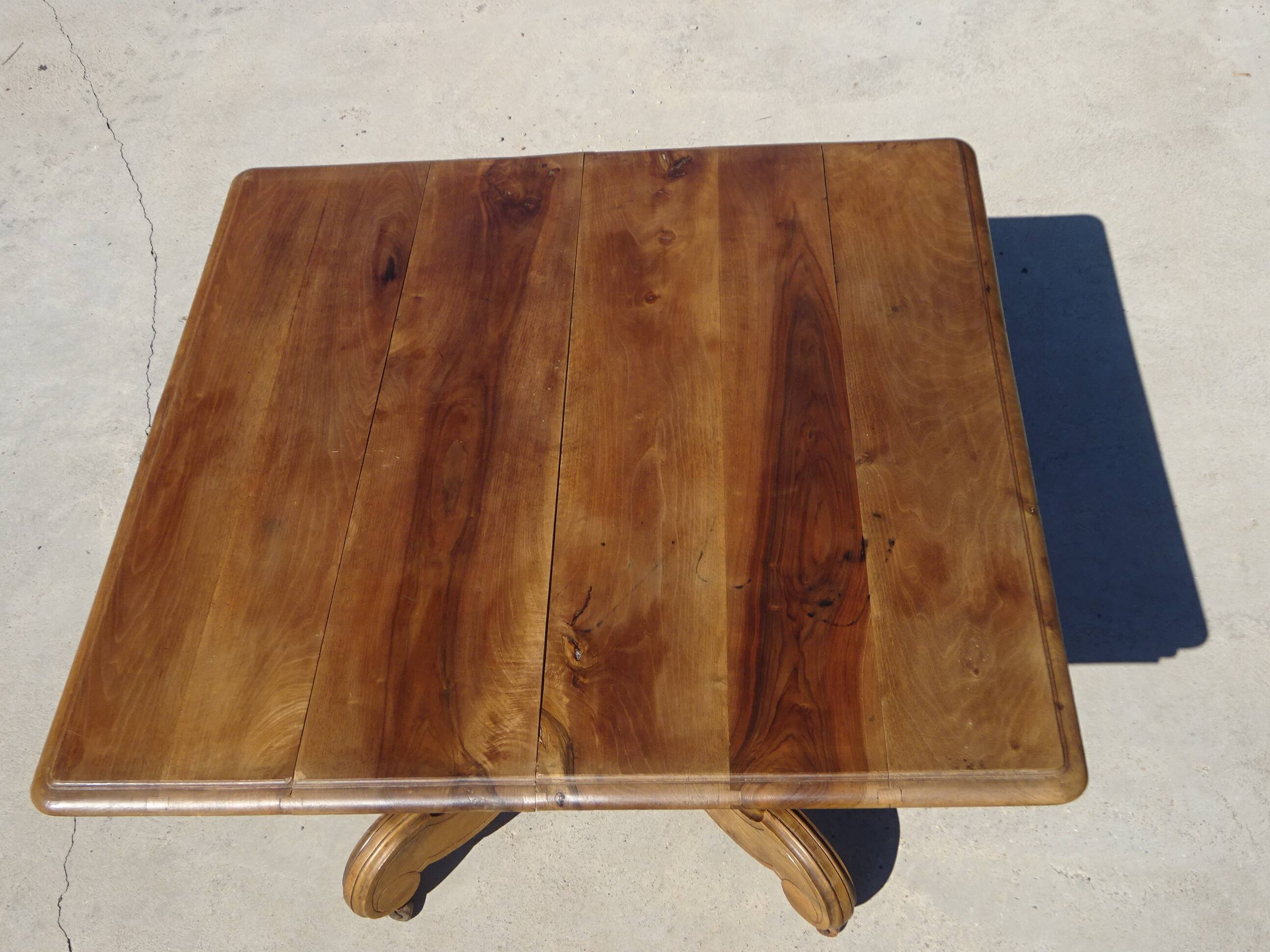 Square dining table, central leg, seats 8