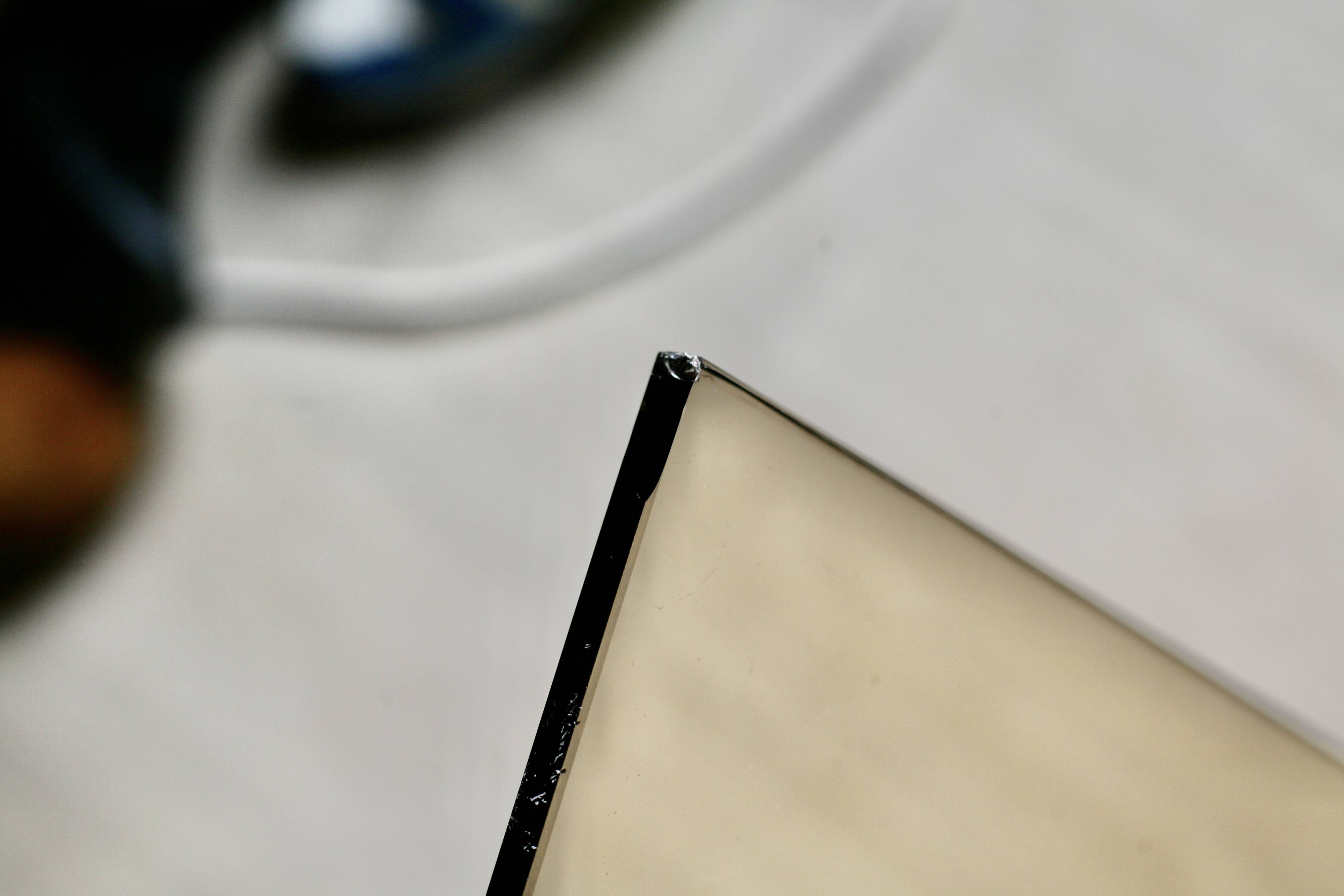 Table basse bois, aluminium et verre fumé. circa 1970